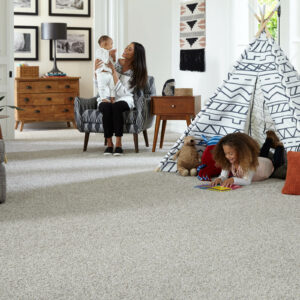 Child playing on carpeting | Flemington Department Store