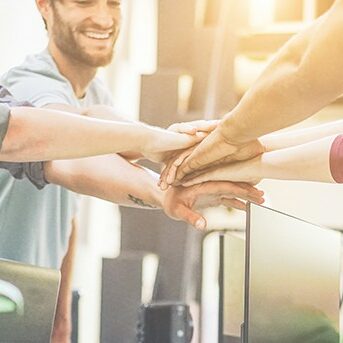 People joining hands | Flemington Department Store